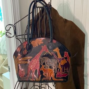 Embossed leather double strap handbag